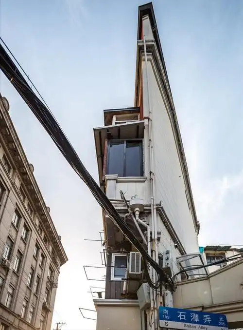 上海的纸片楼将何去何从:拆了略有可惜,留着也非历史建筑