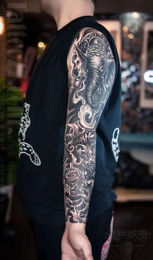 传统花臂纹身纹身图片手臂新传统纹身图案