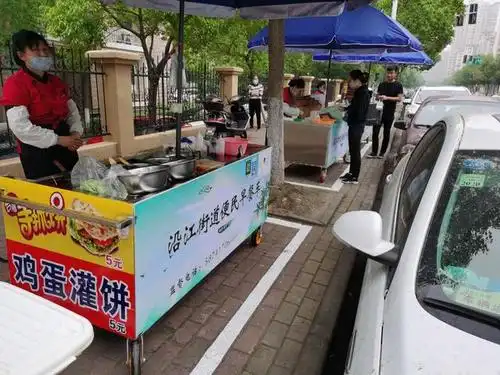 保舌尖安全 流动早餐摊点"转正"记