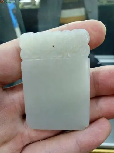 新疆和田山料仿老刀法子冈牌