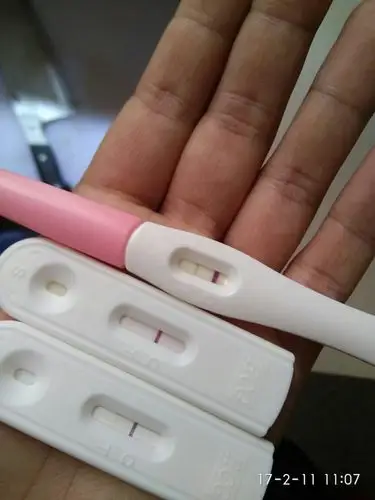 这两天感觉没力肚子胀一点点痛试纸测试两条扛很浅很浅是怀孕了