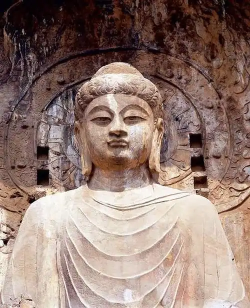 洛阳龙门石窟的修建武则天起到了什么作用