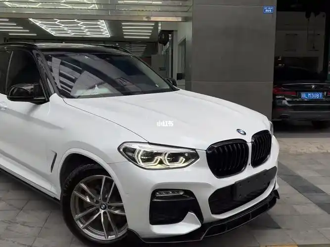 宝马x3贴双拼改色膜黑白配