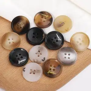 树脂纽扣圆形风衣黑色钮扣高档男西装上衣服大衣仿牛角哑光黑扣子