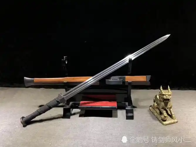 24寸扁柄百炼花纹钢双血槽八面红枝木汉剑