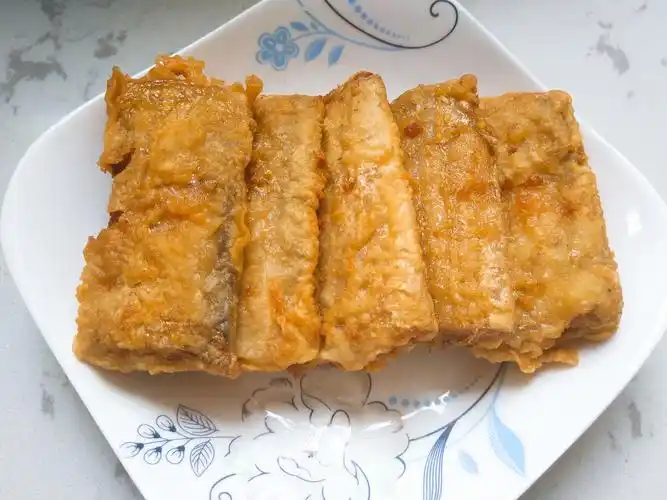 酥炸带鱼到底是要加面粉还是淀粉正确答案供你参考鲜香脆嫩有妙招
