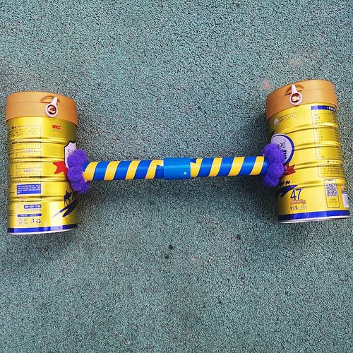 幼儿园自制玩教具手工制作 废旧材料制作奶粉桶举重 体育户外游戏
