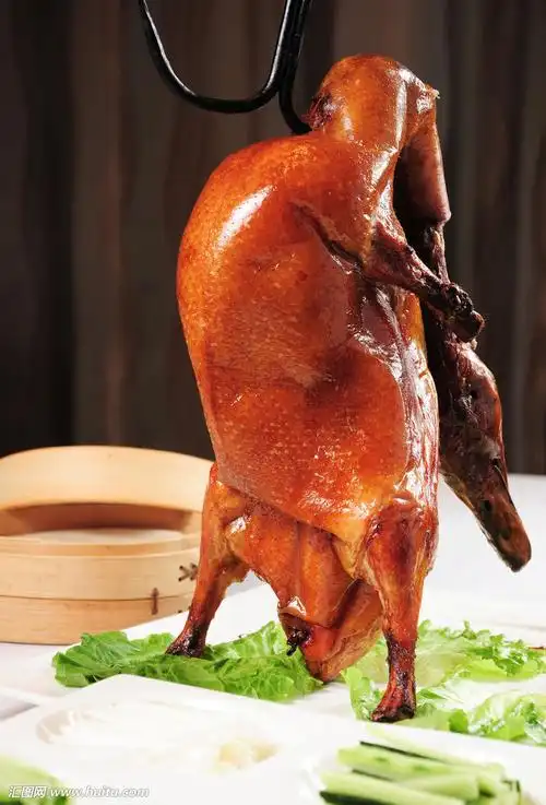 与传统的北京烤鸭,吊炉式烤鸭有本质的区别.