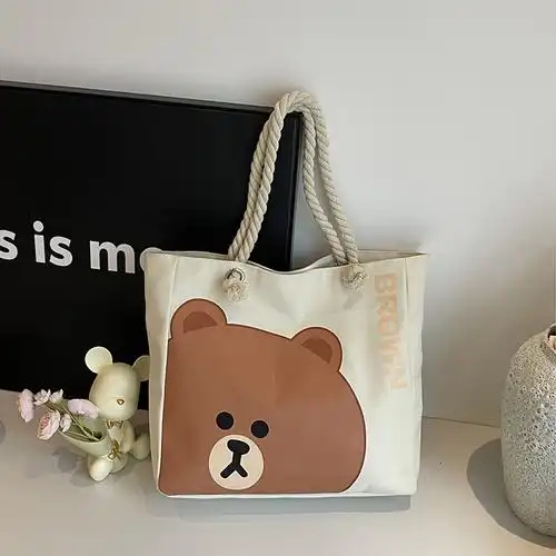 小熊可爱大容量单肩女包通勤上班托特包时尚休闲卡通中学生书包-阿里