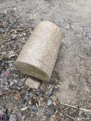 农村压小麦的石滚