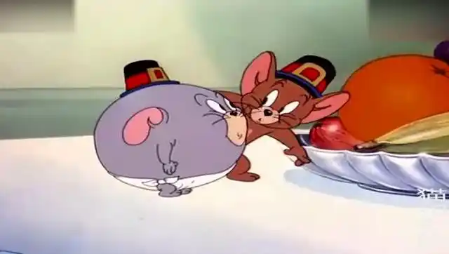 猫和老鼠:小老鼠吃掉了一个橙子,然后他就变成了一只圆老鼠