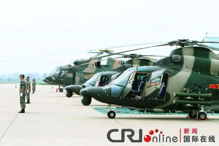 中外记者"零距离"接触解放军直-9wz武装直升机