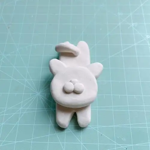 石塑粘土一只趴着的猫咪步骤图