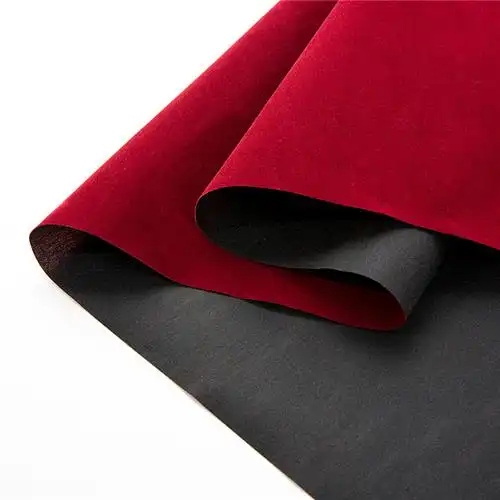 厂家批发植绒柜台布水刺底短毛绒红色剪纸植绒布 布料批发