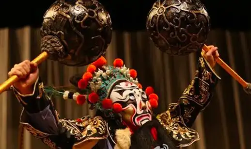 在动画片《大闹天宫》里,巨灵神使的也是锤.