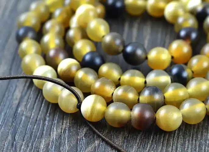 天然牛角108颗正宗黄水牛角佛珠手串 珠径6-10毫米 牛角手链
