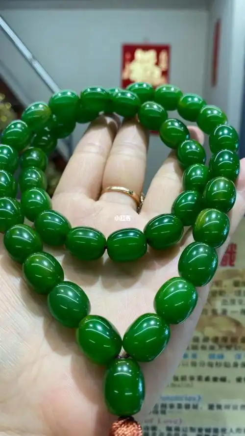 中东贵族蜜蜡33子翡翠绿丝蜡念珠串