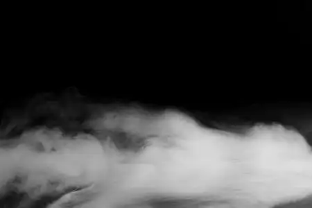 抽象的雾或烟雾移动黑色背景照片