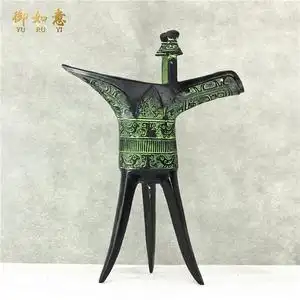 青铜三足酒杯图片