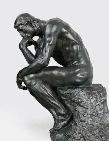 思想者(le penseur)奥古斯特·罗丹安置在群雕"地狱之门"横楣上一座