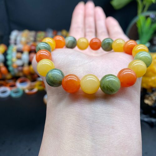 新疆金丝玉地表老料三色多宝10mm圆珠女生手串手链