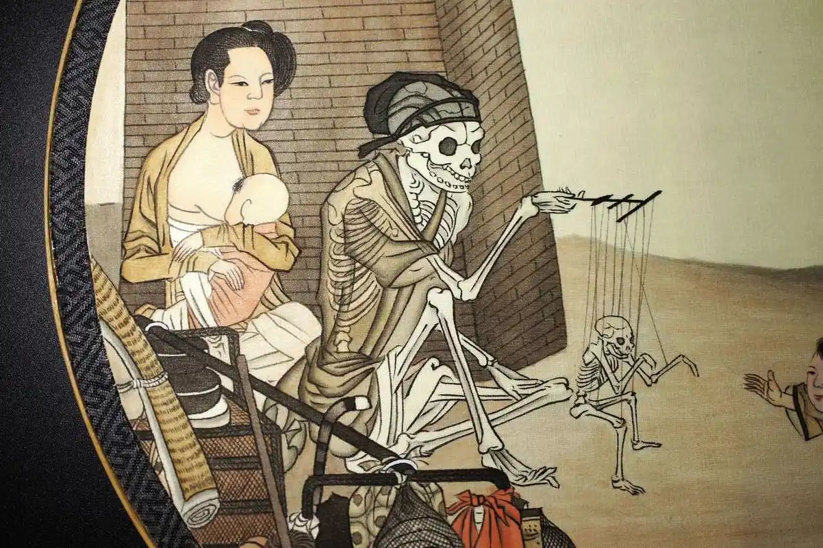 "骷髅幻戏图"扇面成品