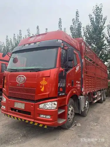 出售二手解放9.6米高栏载货车 前四后八350马力