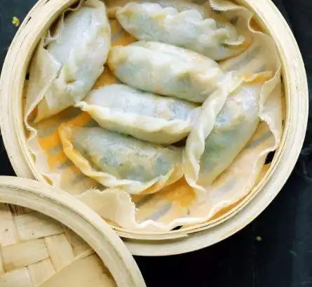 都昌米粑,也称饺子粑,是都昌特色美食,曾被评为"江西名小吃".