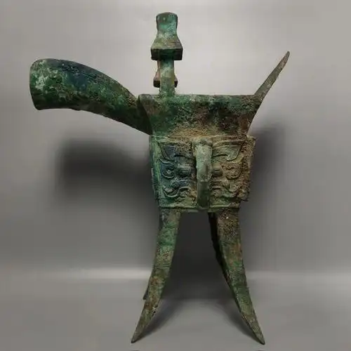 商周青铜兽面四足酒杯