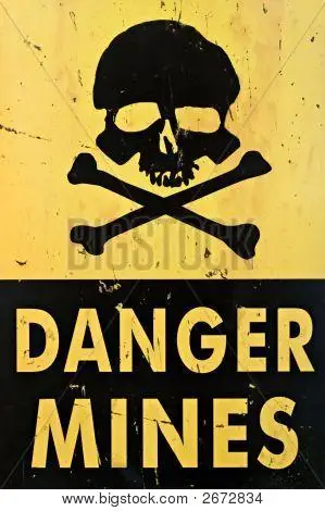 保存取消   保存 old sign warning of land mines or minefield