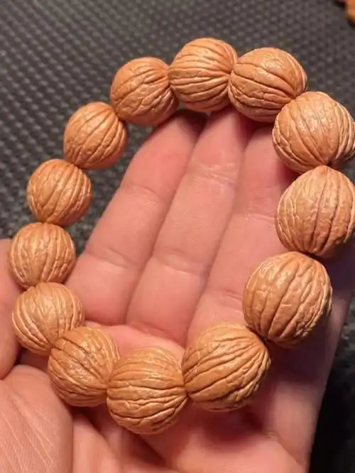 桃核手串多少颗_桃核手串配饰_已知最贵的的桃核手串
