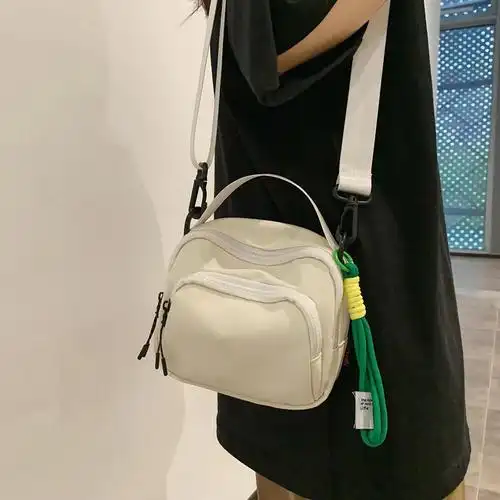 斜挎包包女款单肩挎包2024新款休闲帆布包单肩女包牛津布小方包