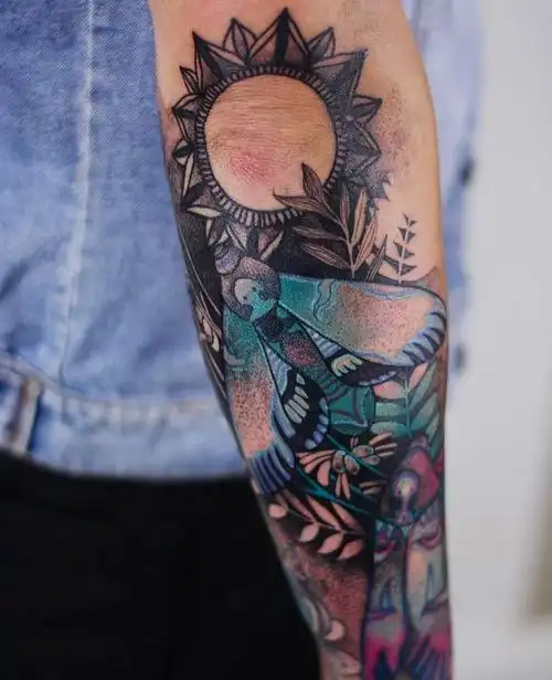小臂彩色点刺风飞蛾梵花月亮纹身图案