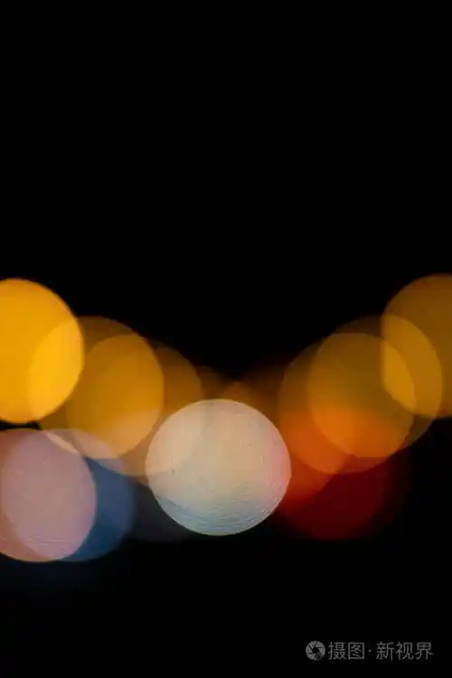 美丽多彩的黑色背景灯模糊的背景夜晚的灯光