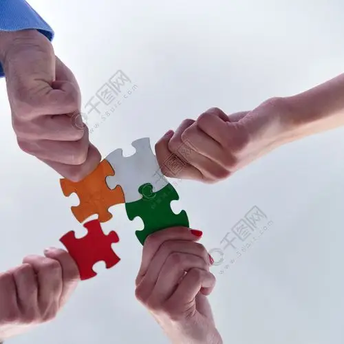 集团的业务人组装拼图,并代表团队的支持和帮助的概念