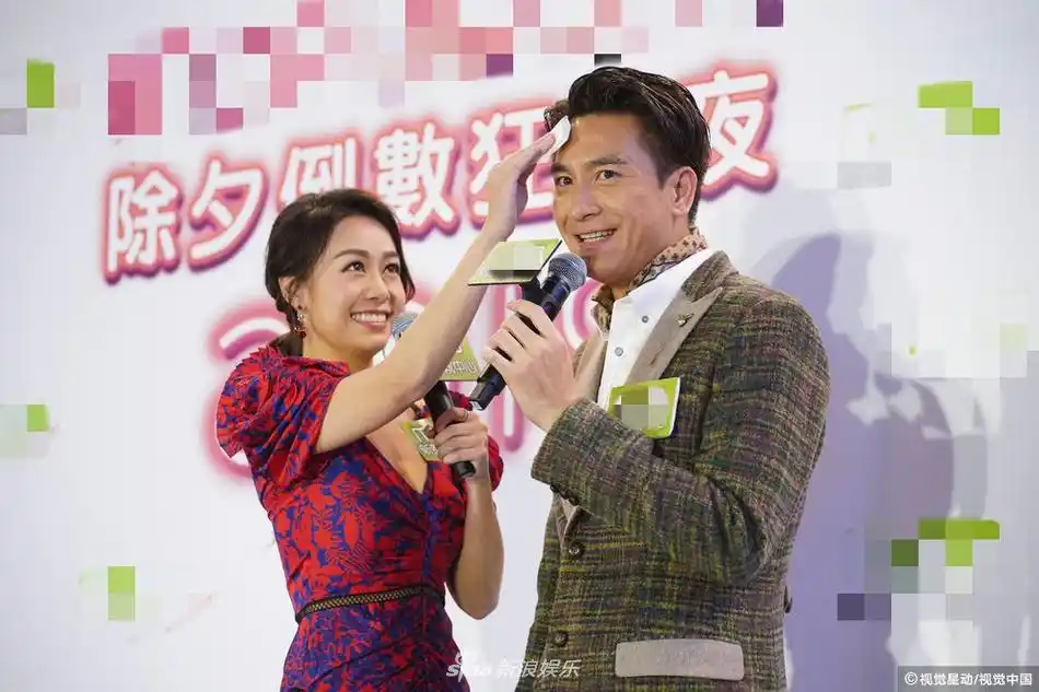 组图:马国明与女友玩胸夹足球 送花给黄心颖遭误会是求婚_高清图集