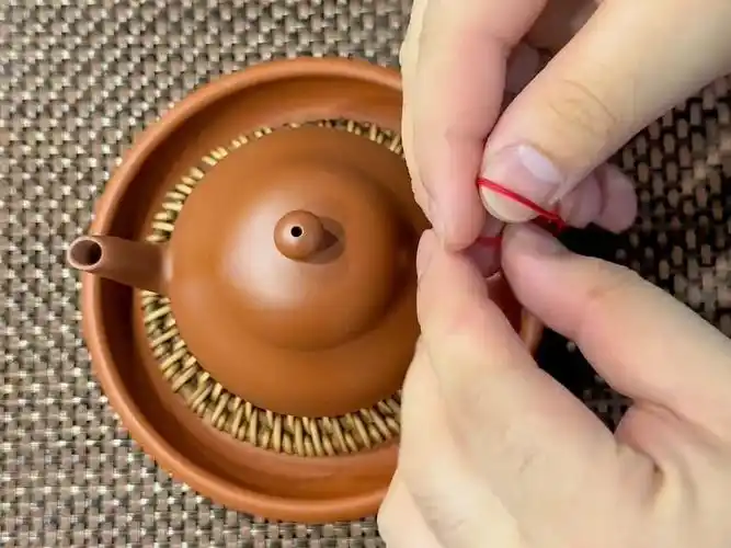 正确绑壶绳的方法.