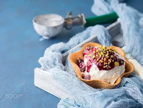 vanilla ice cream scoops in waffle cup by sofya bolotina on 500