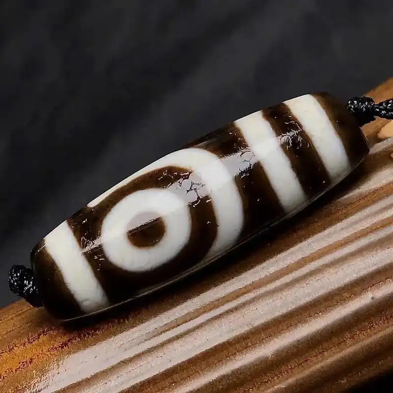 黑白两眼天珠.台湾黑白两眼天珠 料子油糯,咬色线条一流 尺寸 - 抖音