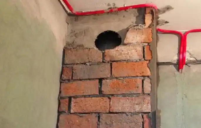 厨房装修时为何要用砖把烟道周围包起来