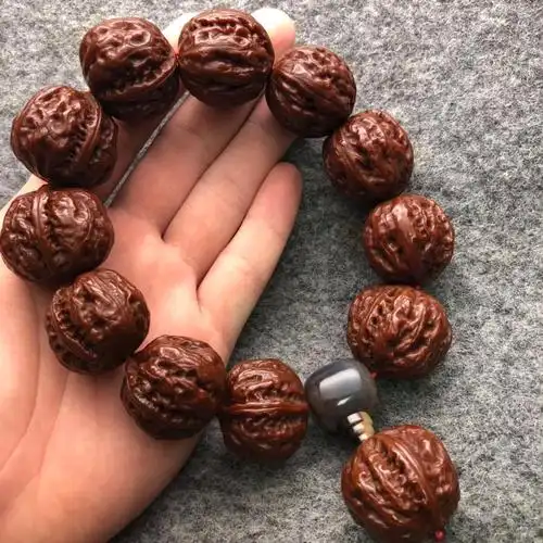 机刷包浆小核桃手持手串文玩核桃把玩练手野生小秋子核桃手把件依莲妃