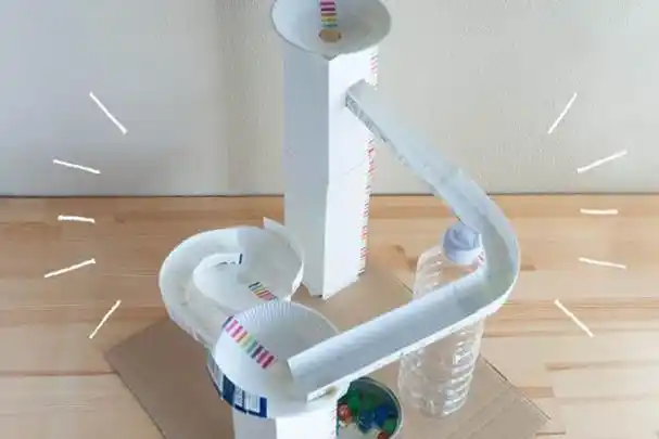 牛奶盒废物利用自制滚球过山车滑梯玩具(步骤图解)_机灵班