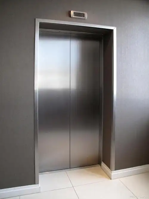 电梯不锈钢门套包边做法