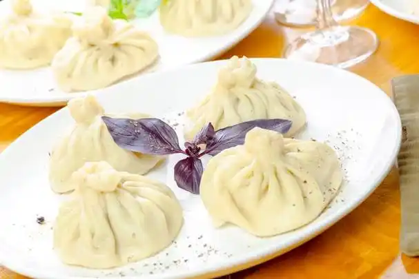 灌汤包#灌汤包是一种著名的中国传统小吃,以其鲜美的汤汁和丰富的