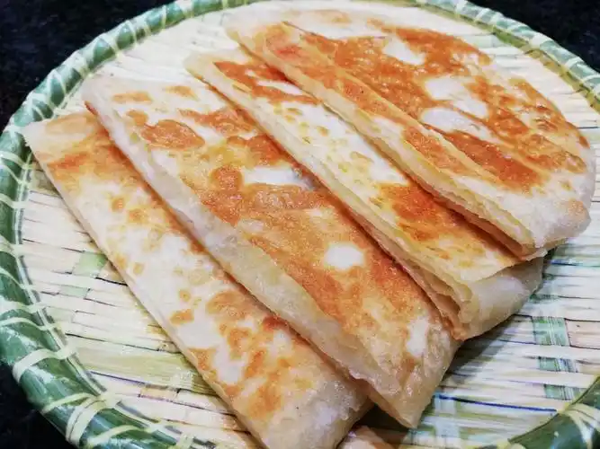 旅行在沈阳,海南女孩吃东北熏肉大饼是什么感觉?毫无违和感!_美食