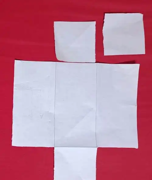 要把一张正方形的硬卡纸制作出一个无盖的长方体纸盒,我的做法如下