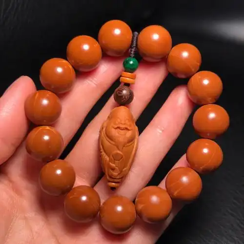 铁核正圆光珠搭配橄榄核雕财神单籽880