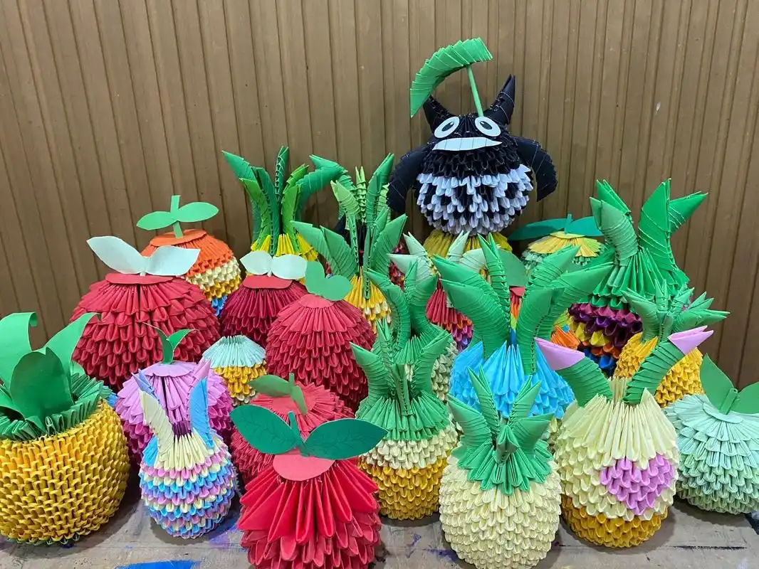 手工折纸【三角插菠萝】95 也叫折纸菠萝95 折纸菠萝是有很多个小