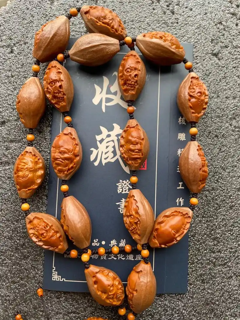 纯手工雕刻  #核雕大师林华     #橄榄核 - 抖音