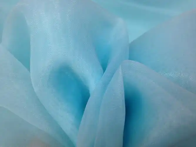 厂家直销现货进口欧根纱,2040婚纱面料礼服布料透明薄纱